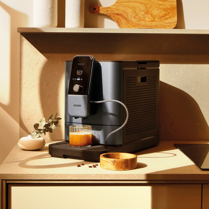 Nivona NIVO 8107 Pearl Blue Espressomaskin Inkl. Avkalkning, Kalkfilter, Mjölkrengöring, Rengöringstabletter & 1 kg Kaffe